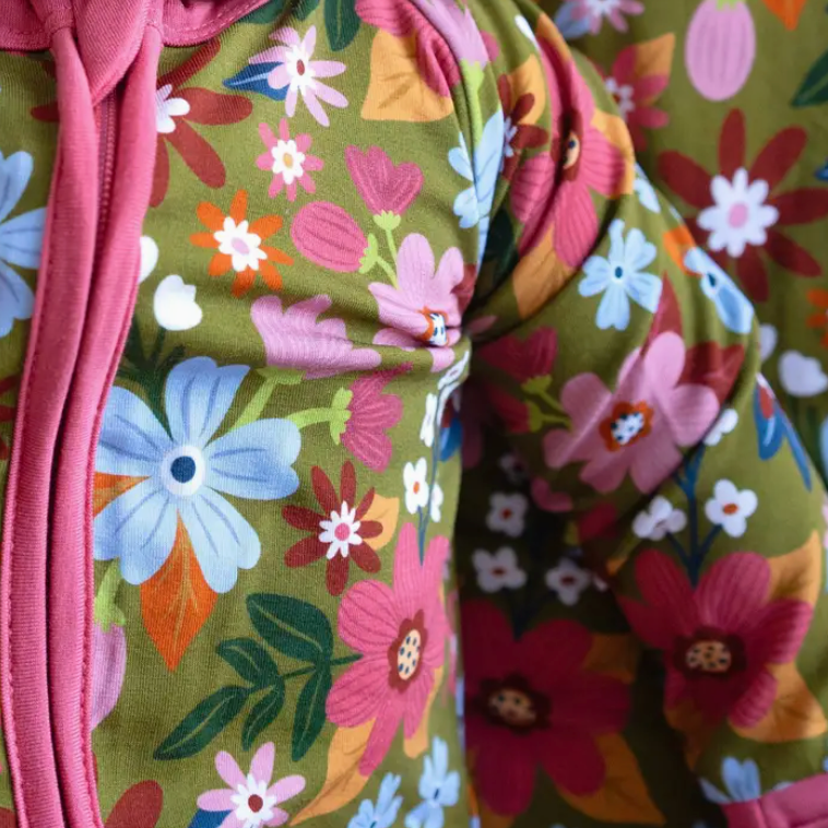 Floral-patterned fabric with a pink zipper