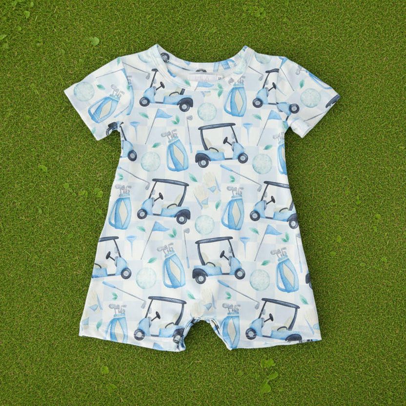 Baby romper with golf cart pattern on a white background